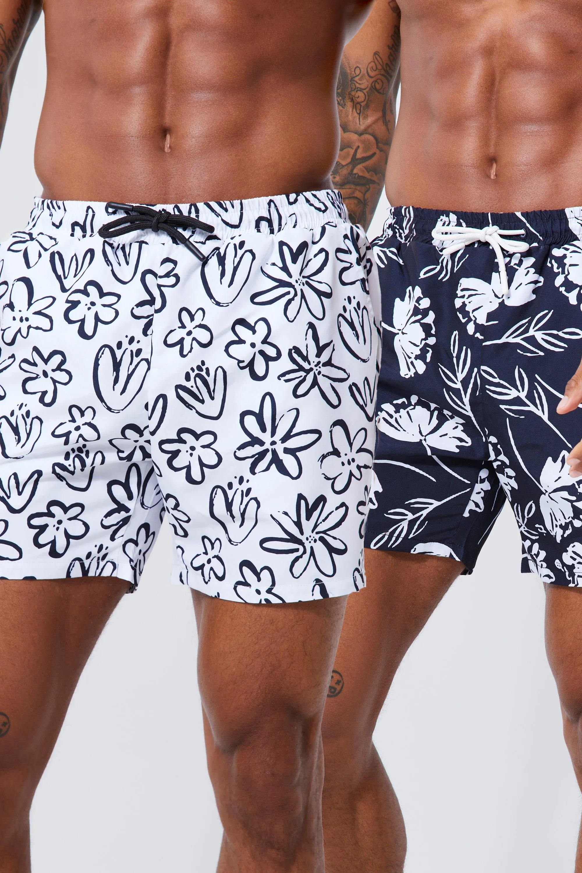 Mid Length 2 Pack Printed Floral Swim Shorts | boohooMAN UK
